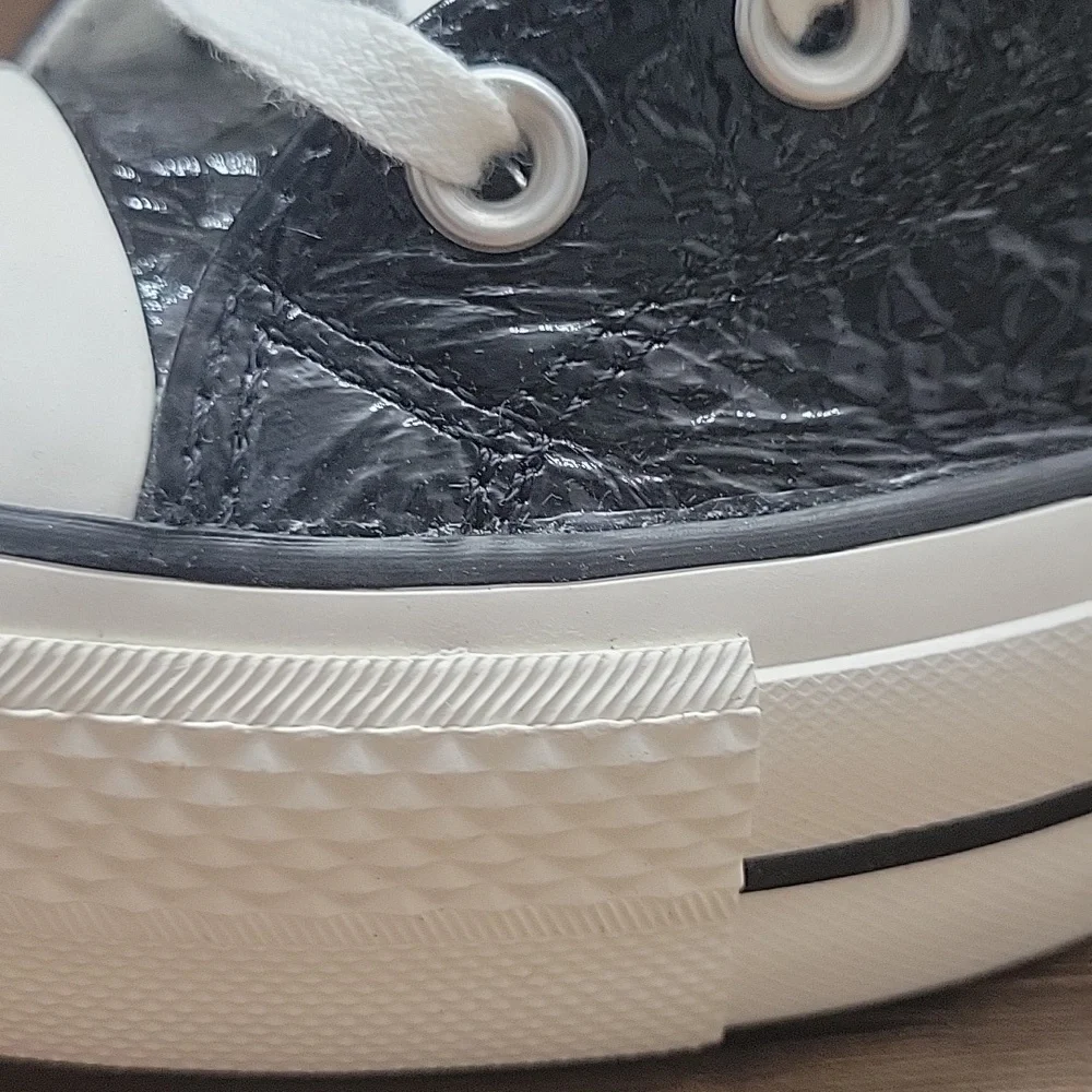 Converse Black and White High-Top Sneakers